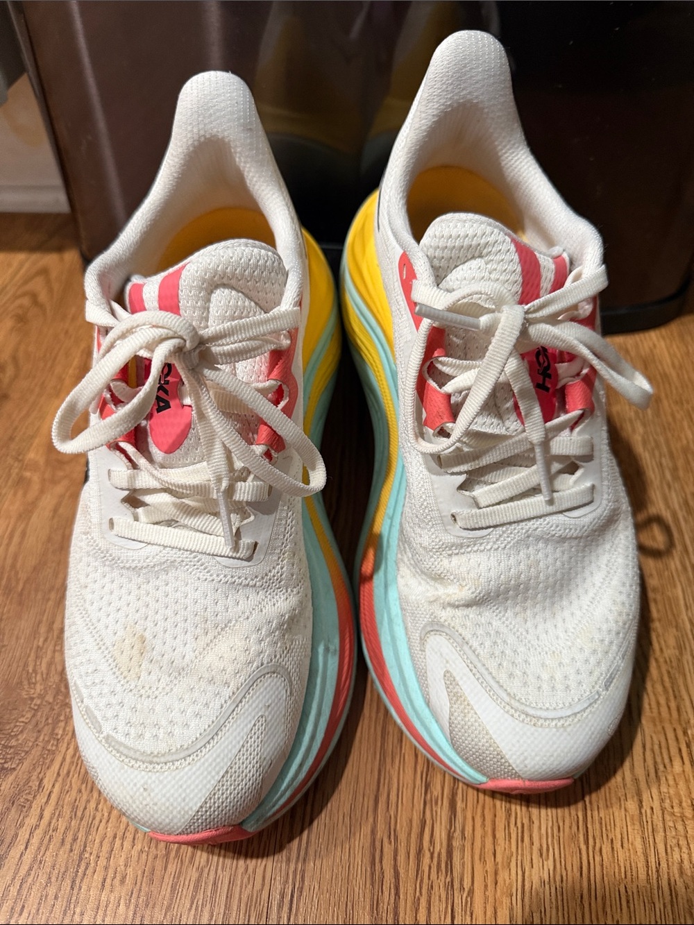 Hoka One One White Running Shoes with Yellow, Aqua and Coral Accents